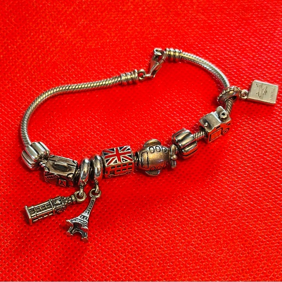 Authentic Pandora Travelers charm bracelet. It’s a must have if u travel a-lot. - Picture 4 of 7